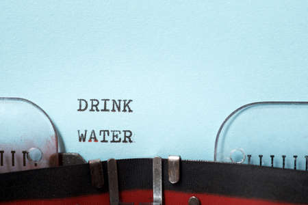 Drink water phrase written with a typewriter.の写真素材