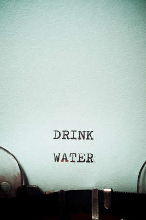 Drink water phrase written with a typewriter.の写真素材