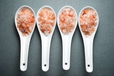Himalayan salt on a little spoonsの写真素材