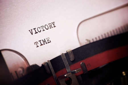 Victory time phrase written with a typewriter.の写真素材