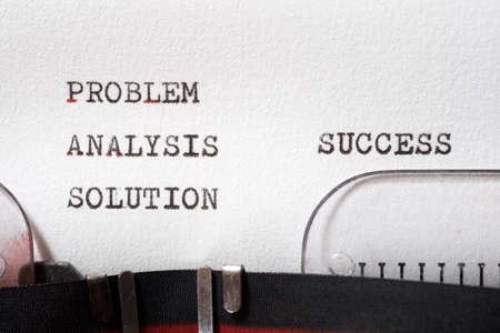 Problem analysis solution and success words written with a typewriter.の写真素材