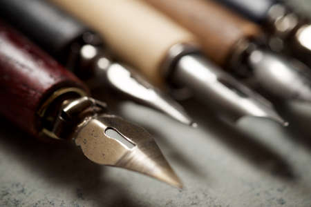 Nib pens for calligraphy on a table.