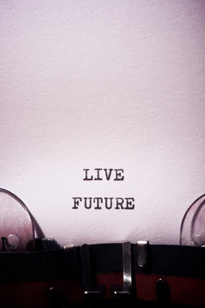 Live future phrase written with a typewriter.の写真素材
