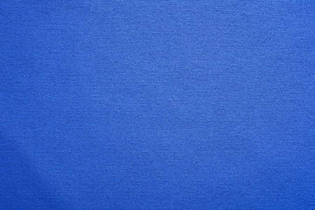 Close-up of the fabric of a waterproof mountain jacket.