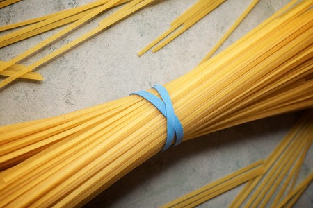 Spaghetti on a stone table.