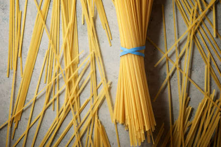 Spaghetti on a stone table.