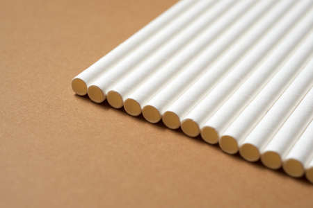 Eco friendly straws on a brown table.の写真素材