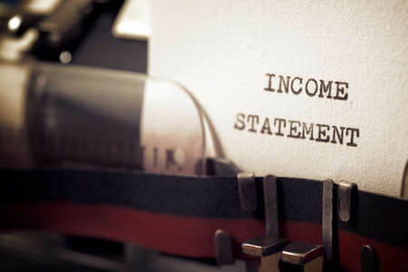 Income statement phrase written with a typewriter.の写真素材