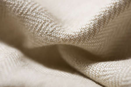 Close-up of a beige colored fabric.の写真素材