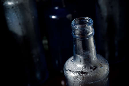 Glass bottles on a table.の写真素材