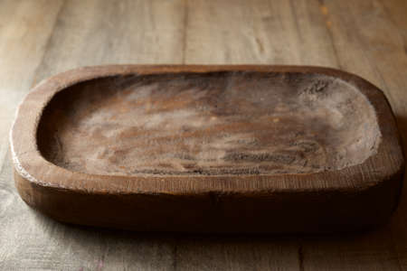 Wooden tray on a wood table.の写真素材