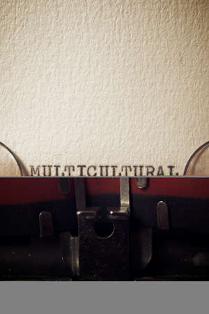 The word multicultural written with a typewriter.の写真素材