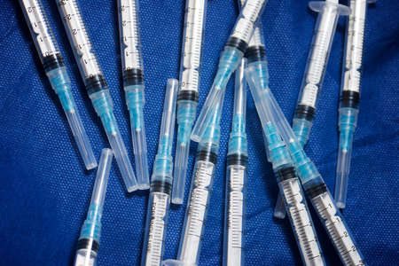Close-up of a group of syringes.