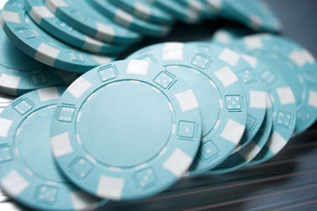 Casino chips on a metal surface,の写真素材