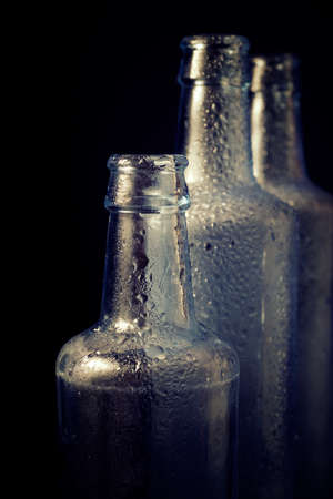 Glass bottles on a table.