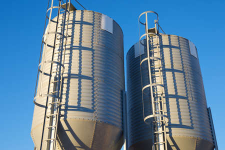 Close-up of metal tanks in a farm in Spain.