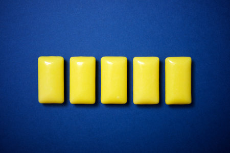 Chewing gum aligned on a table.の写真素材