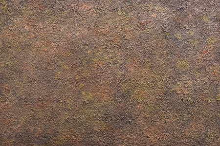 Close-up of a brown stone table.