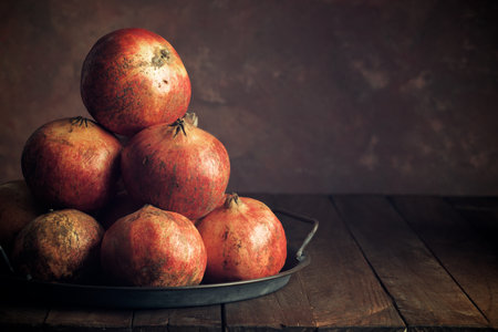 Pomegranates view on a metal trayの写真素材