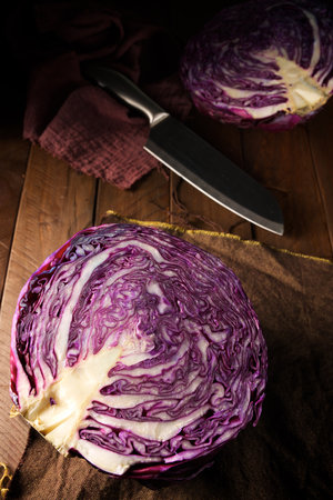 Red cabbage piece on a wood tableの写真素材