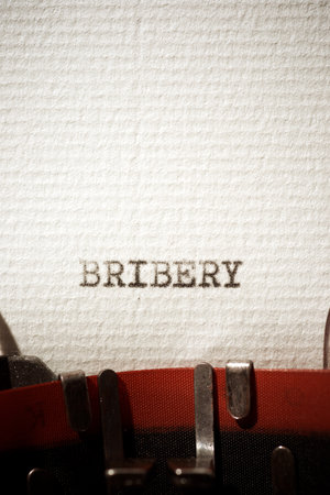 Bribery word written with a typewriter.の写真素材