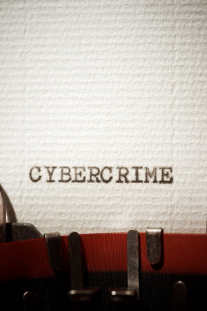 Cybercrime word written with a typewriter.の写真素材