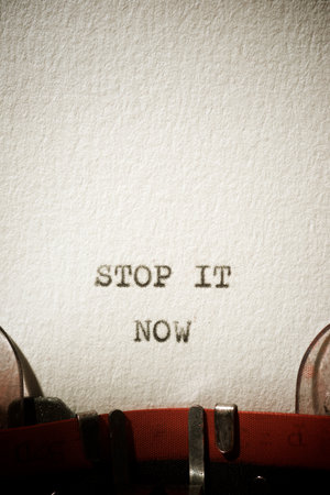 Stop it now text written with a typewriter.の写真素材