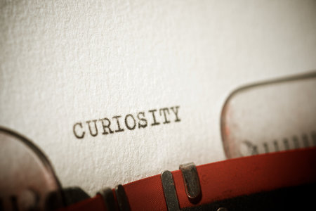 Curiosity word written with a typewriter.の写真素材