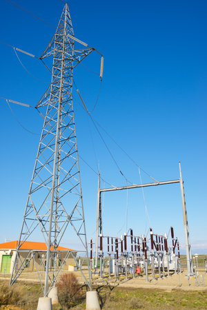 Electrical substation for energy distribution and blue skyの写真素材