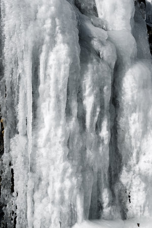 Close-up of a frozen waterfall in the Pyrenees, Tena Valley, Huesca province in Spain.の写真素材