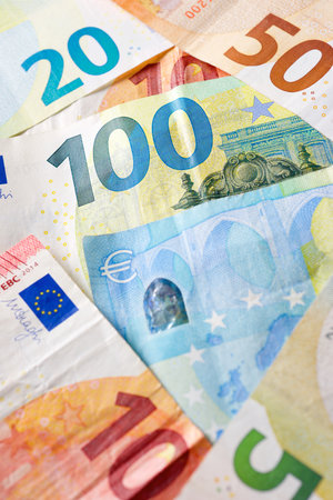 European Union banknotes stacked on a tableの写真素材