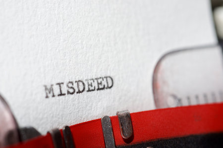 Misdeed word written with a typewriter.の写真素材