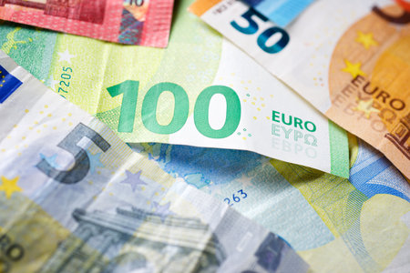 European Union banknotes stacked on a tableの写真素材