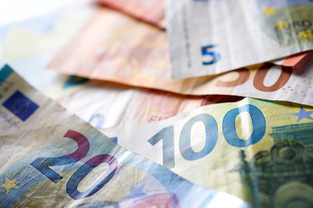 European Union banknotes stacked on a tableの写真素材