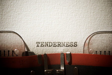 Tenderness word written with a typewriter.の写真素材