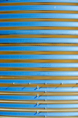Background created with the foreground of a metal water tankの写真素材
