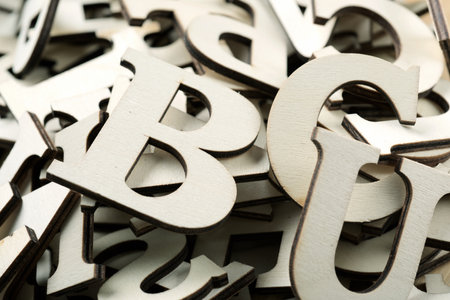 Close-up of stacked wooden letters for playの写真素材