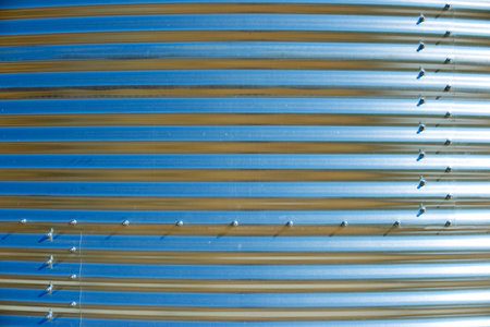 Background created with the foreground of a metal water tankの写真素材