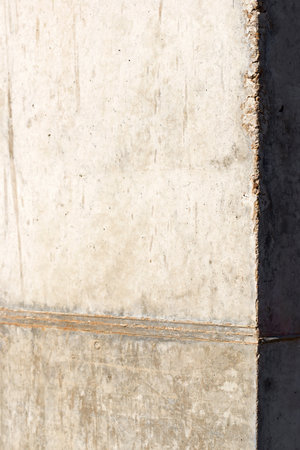 Texture of an old and weathered reinforced concrete wall.の写真素材