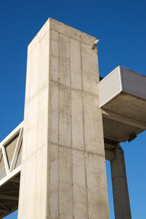 Concrete footbridge for the passage of people over a railroad track in Spainの写真素材