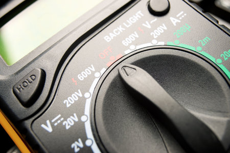 Close-up of a black voltmeter for electrical measurementsの写真素材