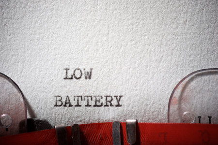Low battery text written with a typewriter.の写真素材