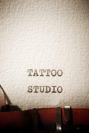 Tattoo studio text written with a typewriter.の写真素材