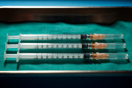 Closeup of a syringe to administer medicationの写真素材