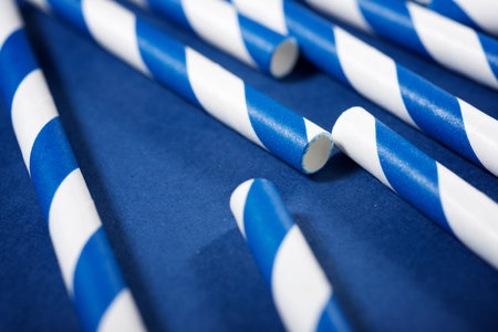 Close up of disposable drinking straws made of cardboard on a tableの写真素材
