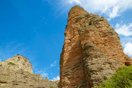 Peak named Aguja Roja in Riglos, Pyrenees, Aragon in Spainの写真素材
