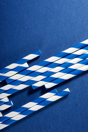 Close up of disposable drinking straws made of cardboard on a tableの写真素材