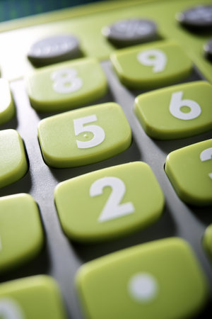Close-up of a green calculator for kidsの写真素材