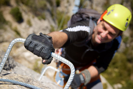 Climbing a ferrata route in Calcena, Zaragoza province, Aragon in Spainの写真素材
