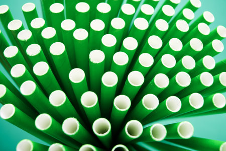 Close up of disposable drinking straws made of cardboard on a tableの写真素材